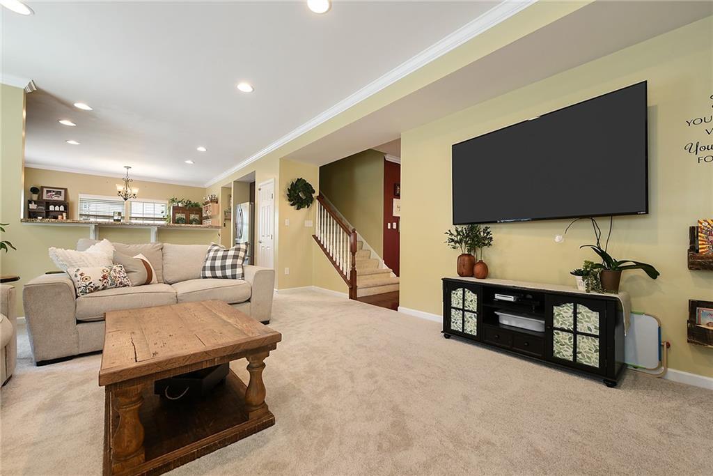 179 Broadstone Drive Mars, PA 16046 - Photo 7 of 25 a living room with furniture and a flat screen tv
