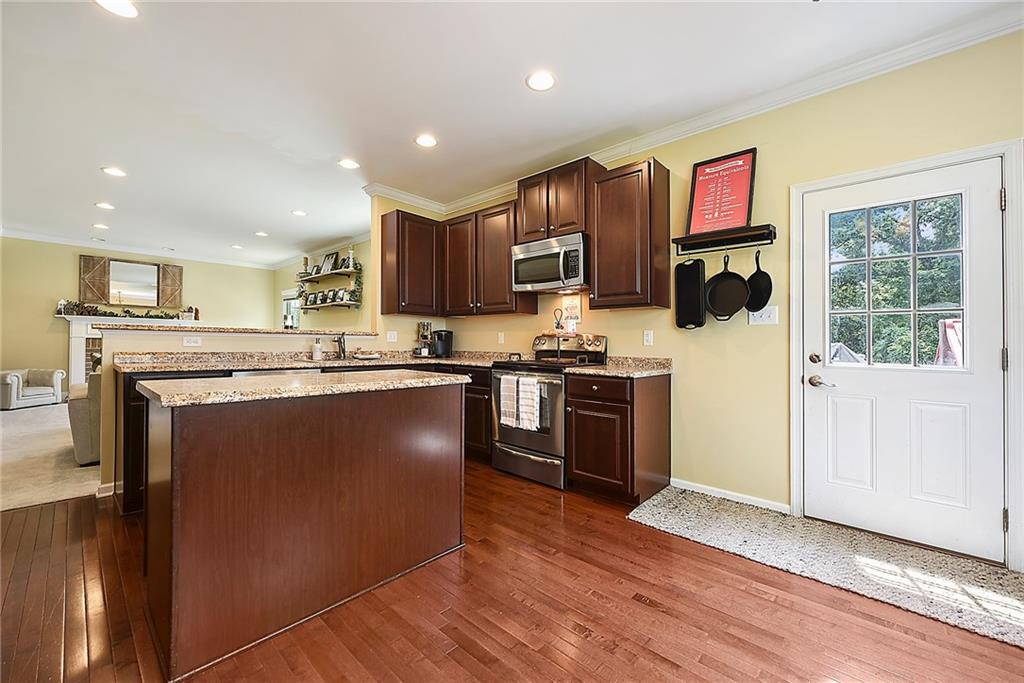 179 Broadstone Drive Mars, PA 16046 - Photo 10 of 25 a kitchen with stainless steel appliances granite countertop a refrigerator a stove top oven a sink and dishwasher