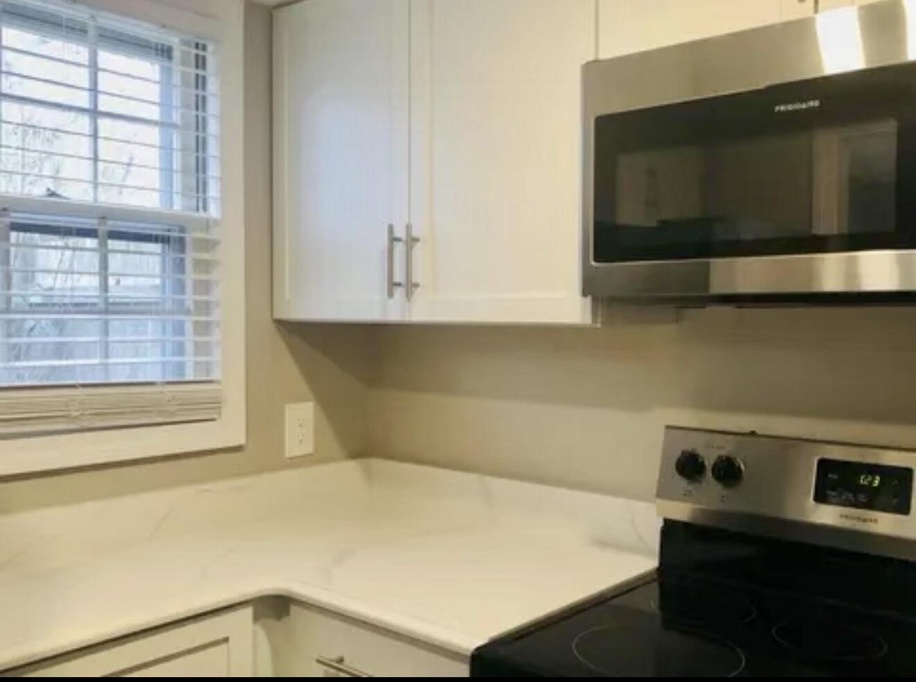 135 West Main Street, Unit 26 Hyannis, MA 02601 - Photo 5 of 9 a kitchen with a cabinets and appliances