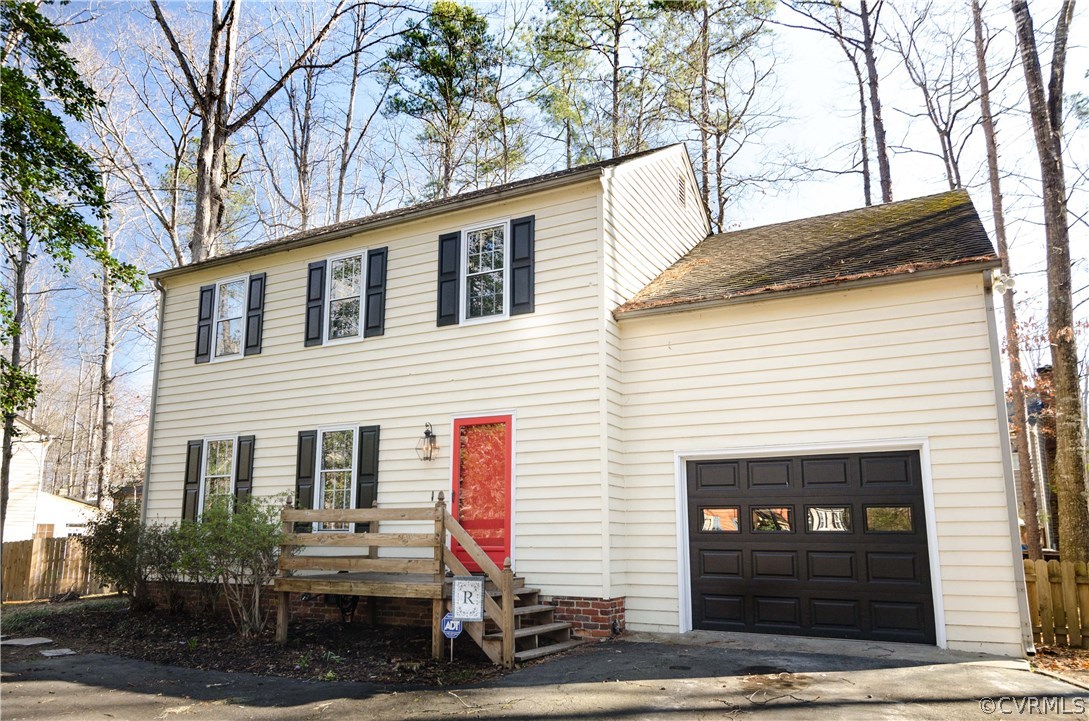 3207 Fox Chase Road Midlothian, VA 23112 - Photo 1 of 21 a front view of a house with garage
