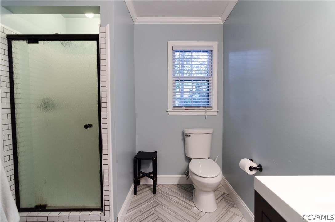 3207 Fox Chase Road Midlothian, VA 23112 - Photo 15 of 21 a bathroom with a toilet a sink and a window