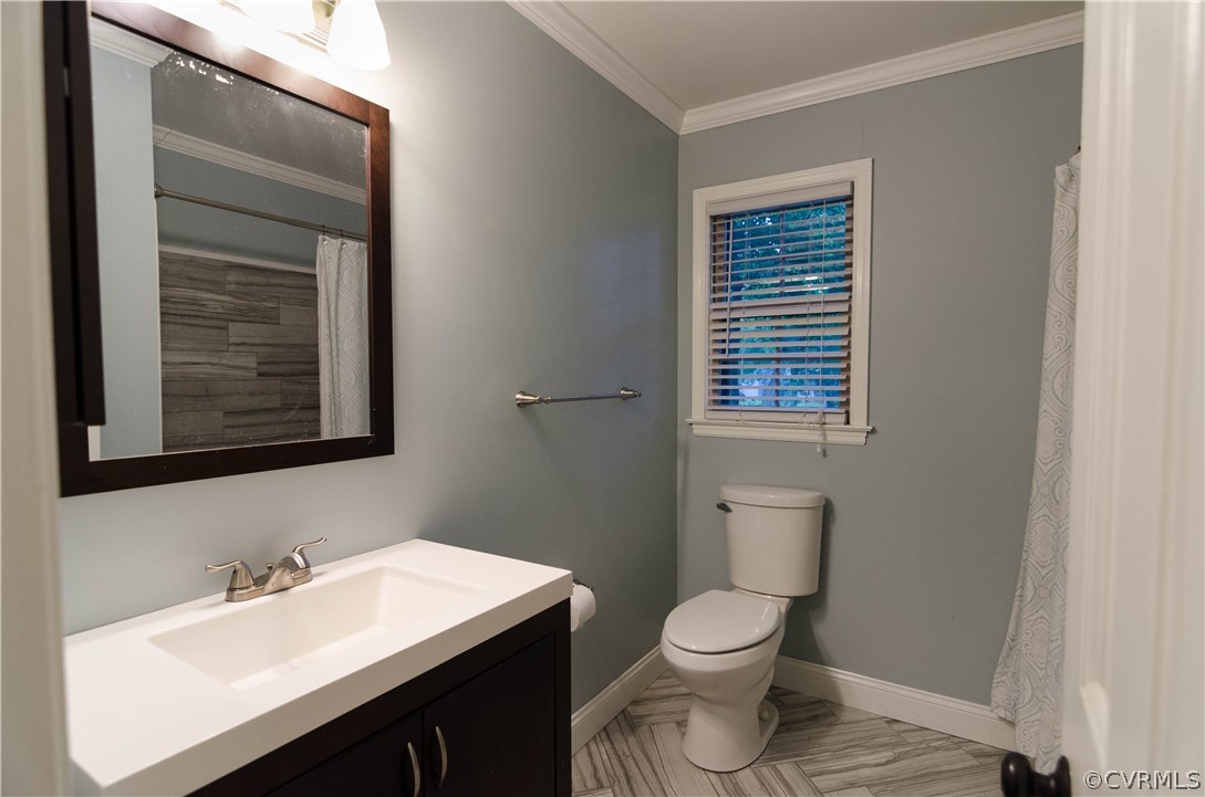 3207 Fox Chase Road Midlothian, VA 23112 - Photo 19 of 21 a bathroom with a toilet a sink and mirror