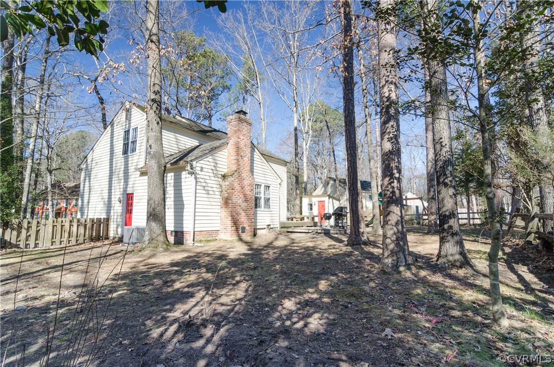 3207 Fox Chase Road Midlothian, VA 23112 - Photo 21 of 21 a view of a house with a small yard and sitting area