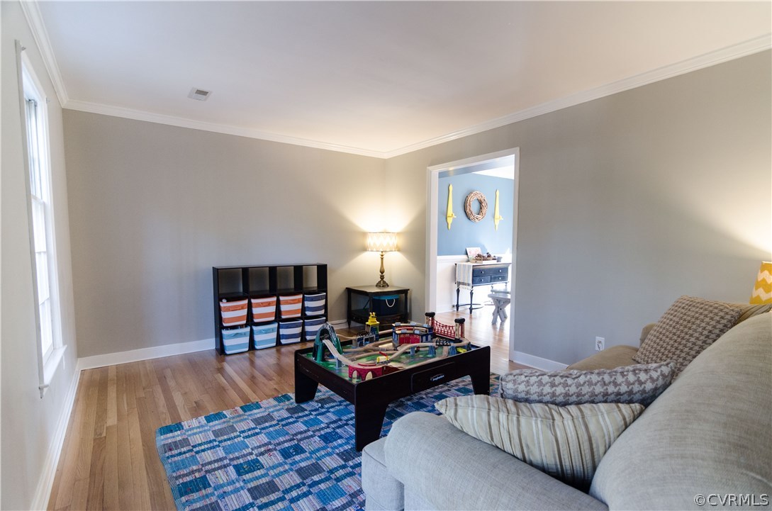 3207 Fox Chase Road Midlothian, VA 23112 - Photo 5 of 21 a living room with furniture and wooden floor