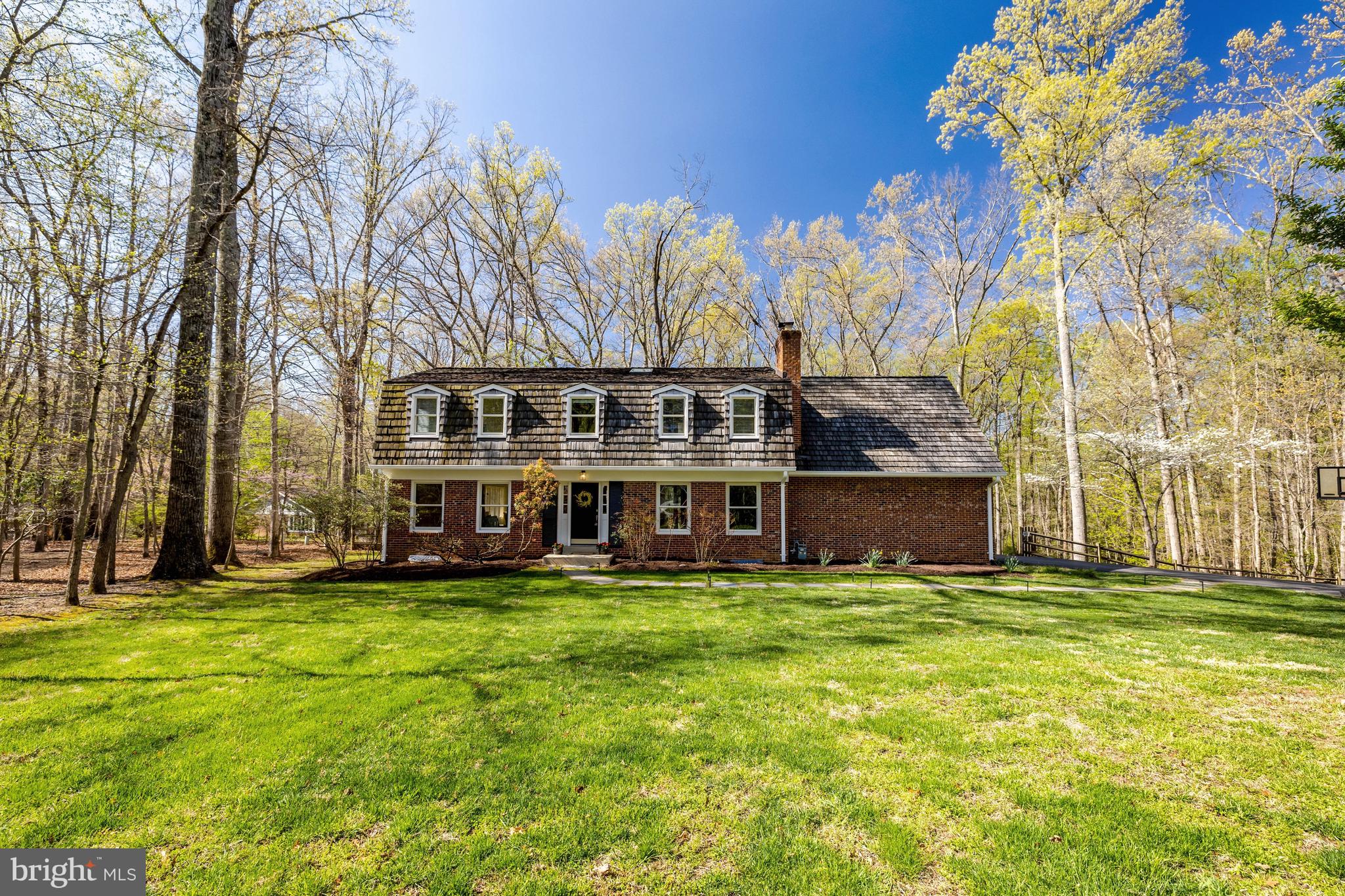 11809 State Rte 4707 Reston, VA 20191 - Photo 59 of 70 A view of the front of the home and lawn.
