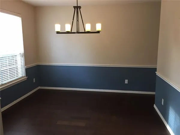 en view of an empty room with a window