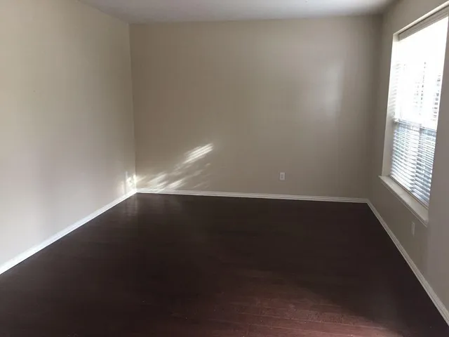 an empty room with a window