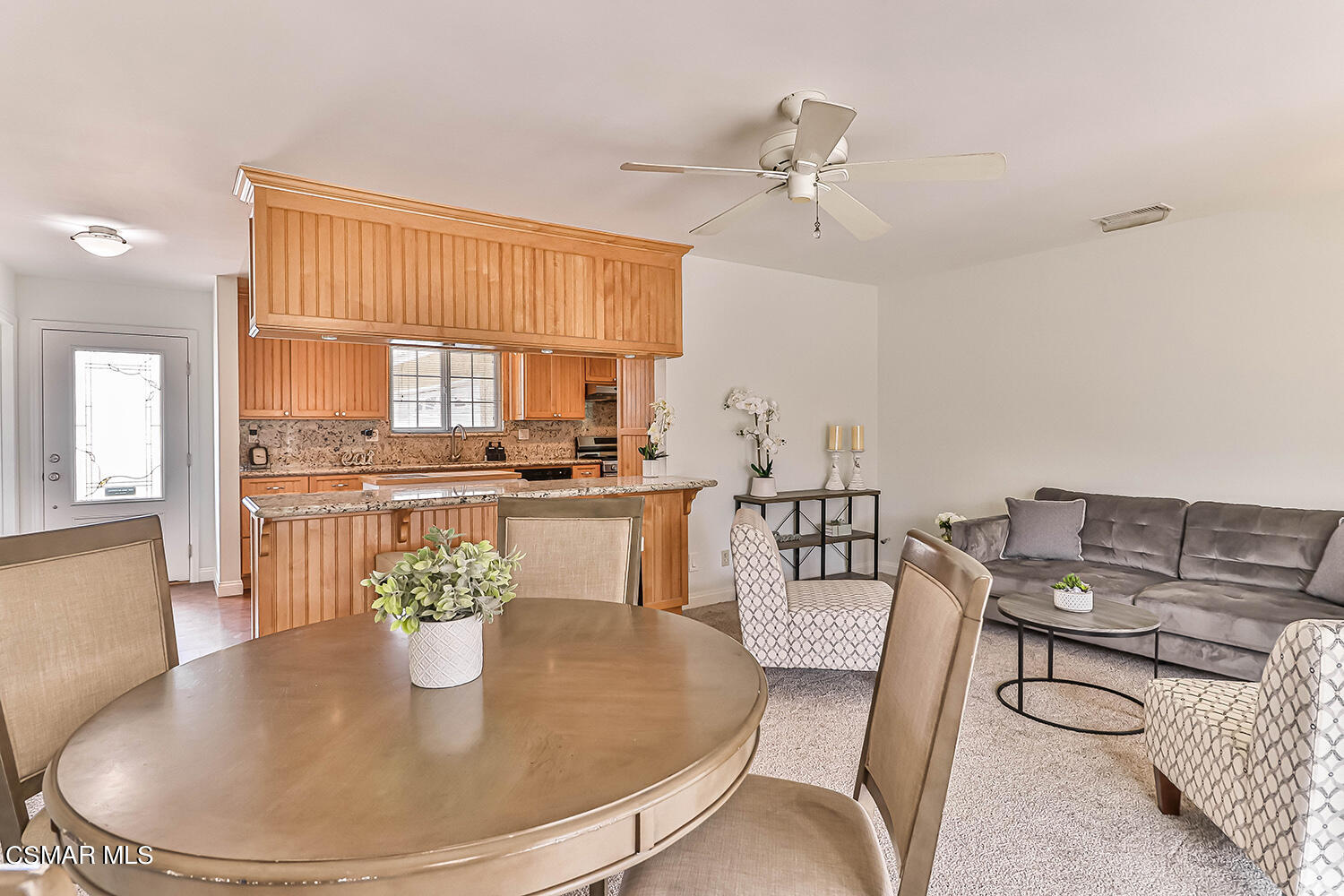 1648 Spence Street Simi Valley, CA 93065 - Photo 13 of 41 a dining room with furniture and wooden floor
