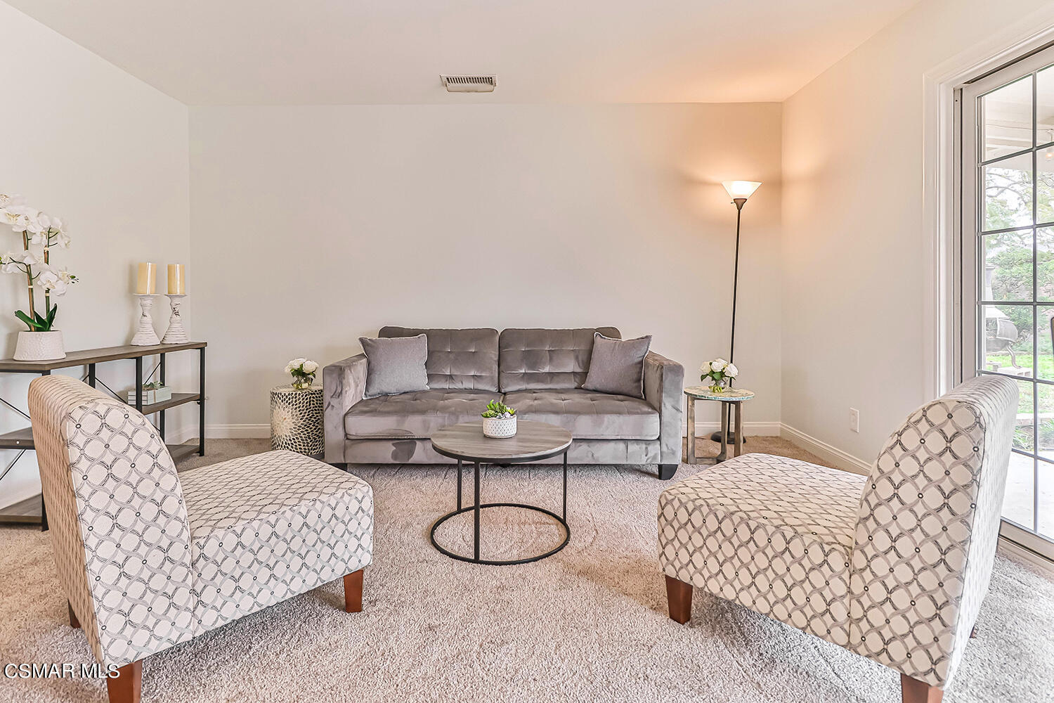 1648 Spence Street Simi Valley, CA 93065 - Photo 14 of 41 a living room with furniture and a window