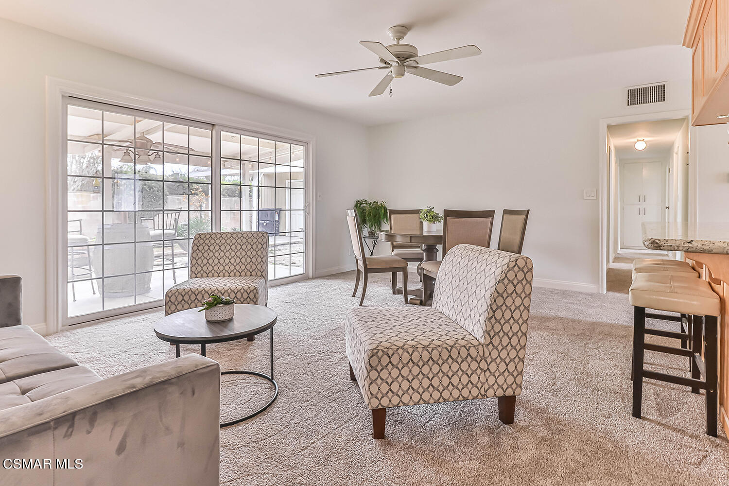1648 Spence Street Simi Valley, CA 93065 - Photo 16 of 41 a living room with furniture and a large window