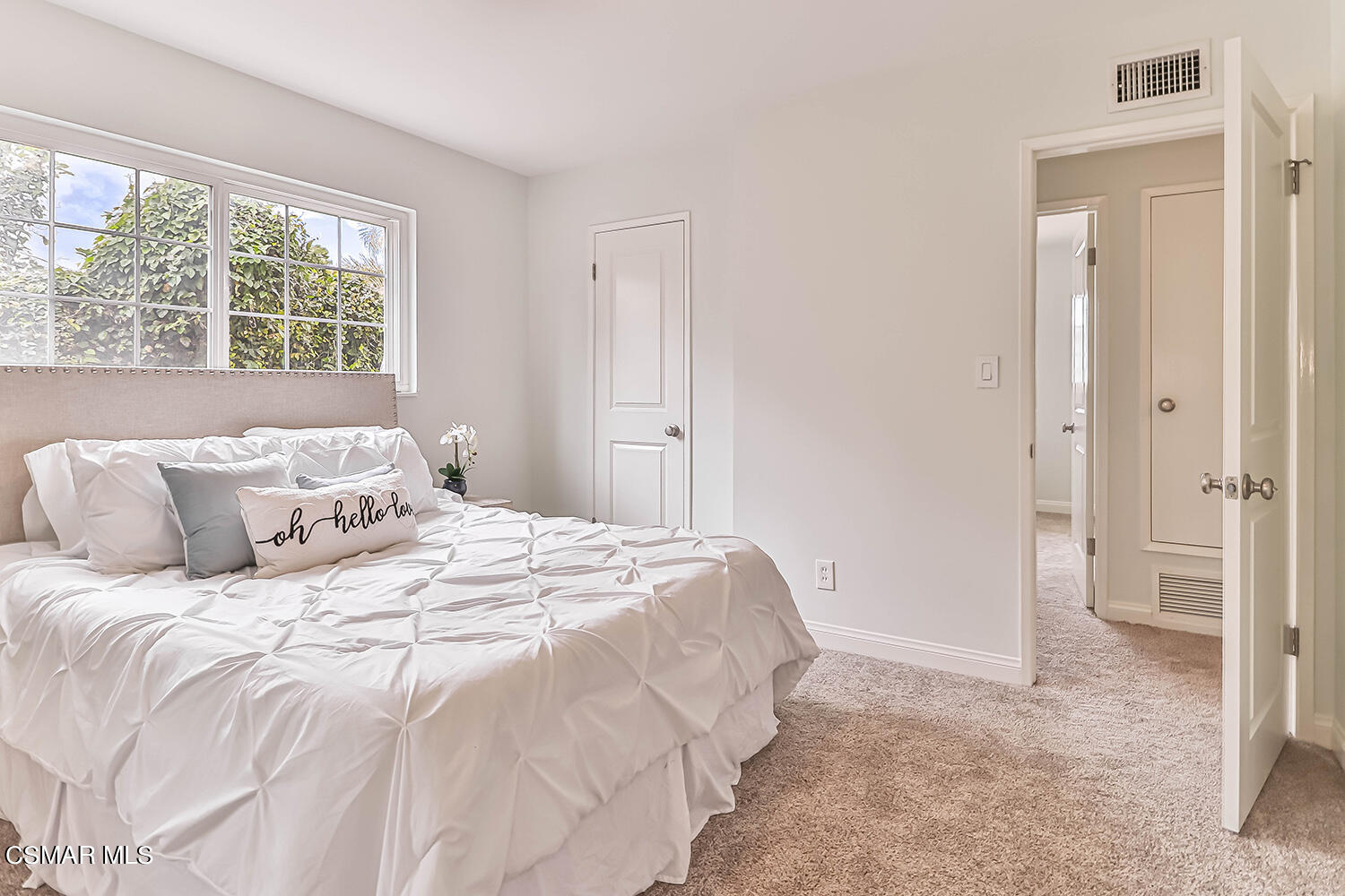 1648 Spence Street Simi Valley, CA 93065 - Photo 18 of 41 a bedroom with a bed and a window