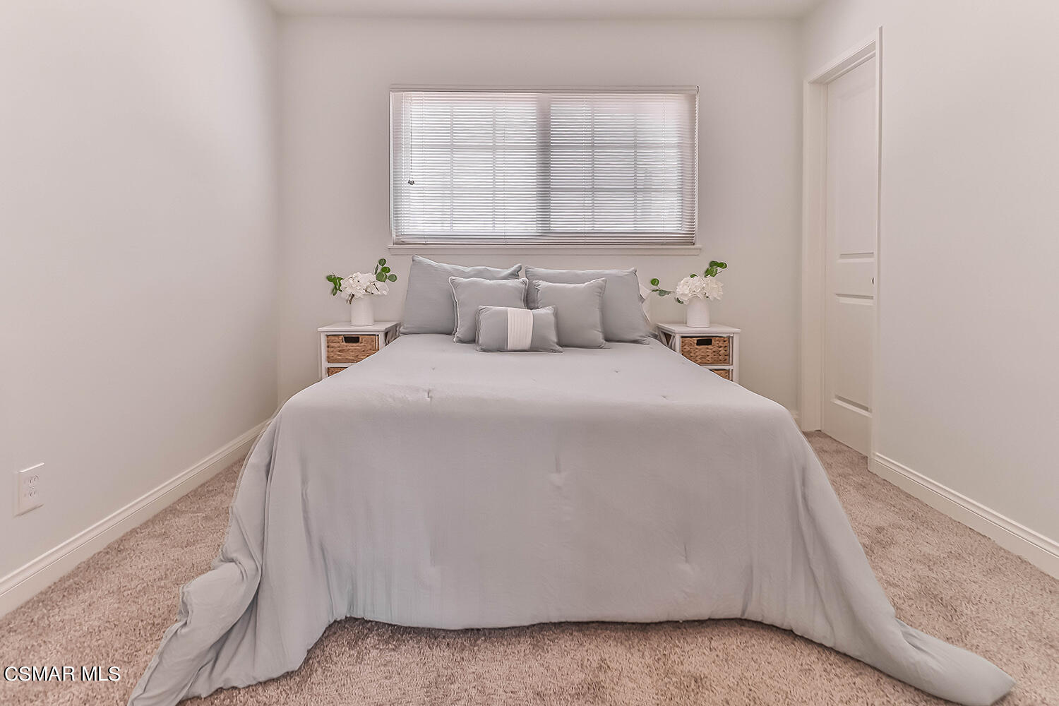 1648 Spence Street Simi Valley, CA 93065 - Photo 22 of 41 a bedroom with a bed and a window