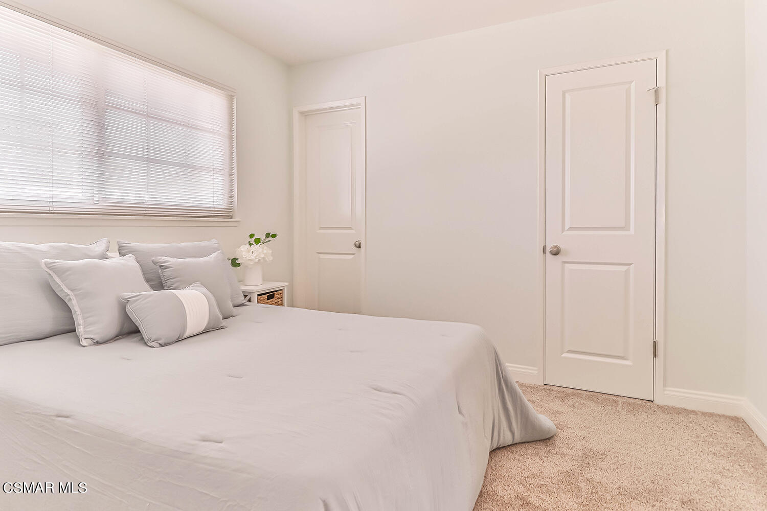 1648 Spence Street Simi Valley, CA 93065 - Photo 24 of 41 a bedroom with a bed and a window