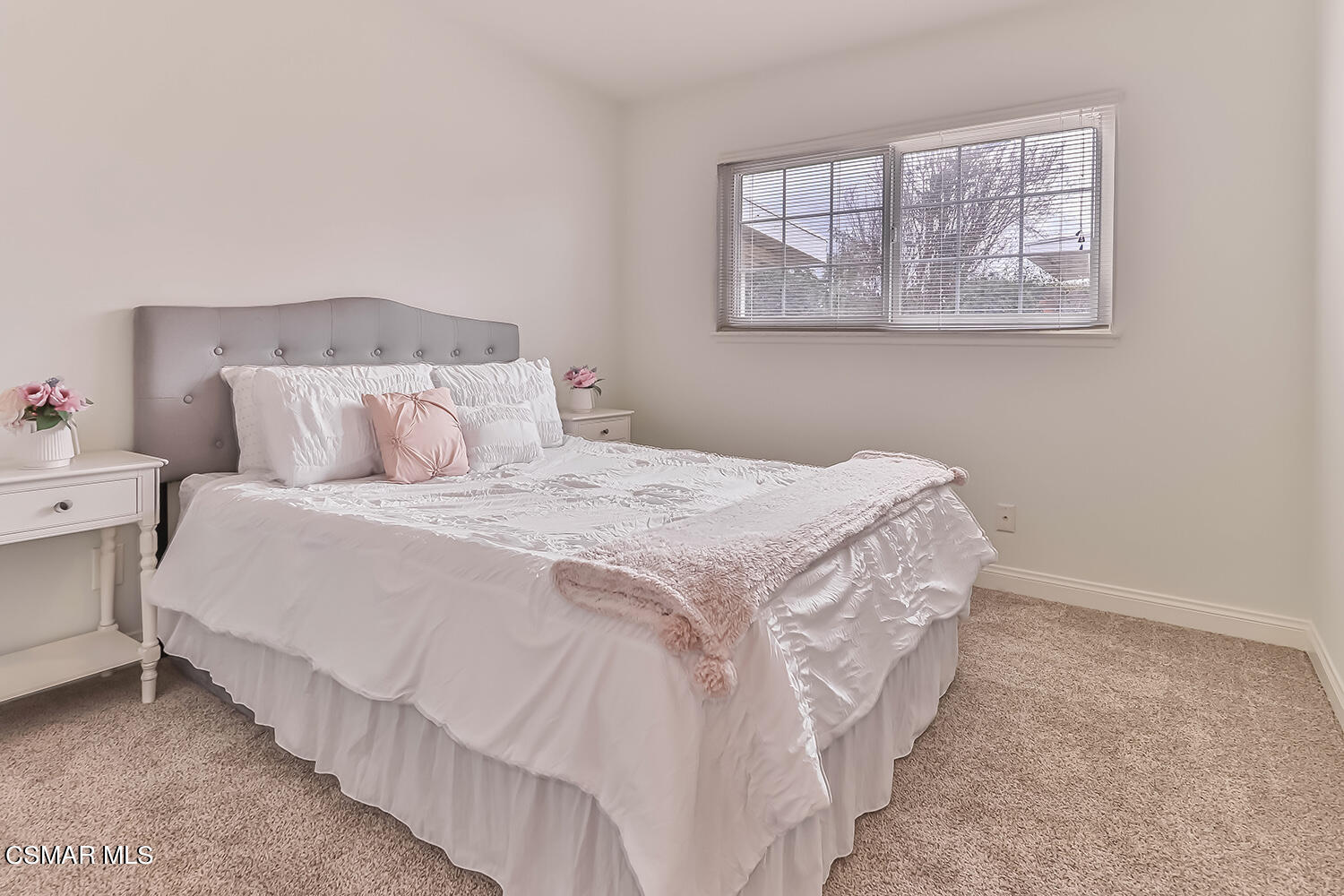 1648 Spence Street Simi Valley, CA 93065 - Photo 27 of 41 a bedroom with a bed and a window