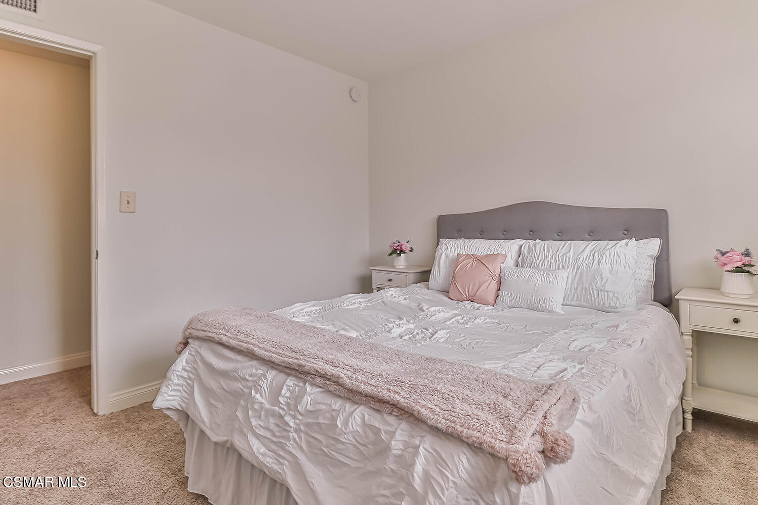 1648 Spence Street Simi Valley, CA 93065 - Photo 28 of 41 a bedroom with a bed and pillows