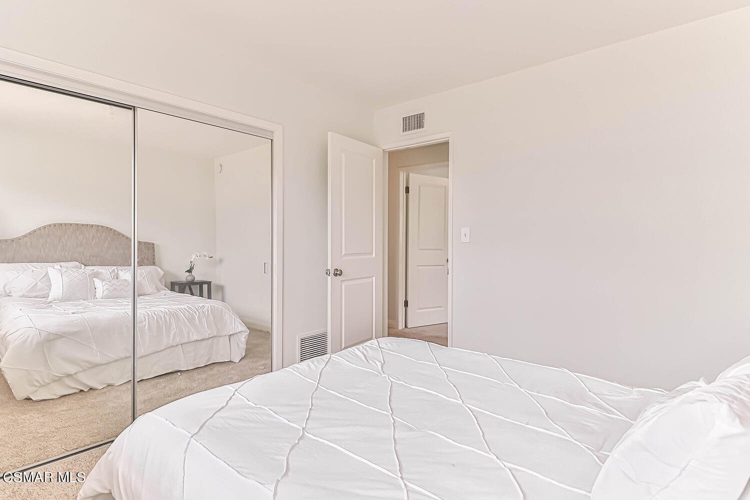 1648 Spence Street Simi Valley, CA 93065 - Photo 30 of 41 a bedroom with a bed and a closet