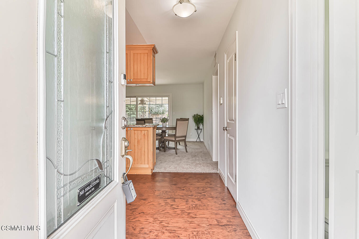 1648 Spence Street Simi Valley, CA 93065 - Photo 3 of 41 a view of a hallway with living room and dining room view