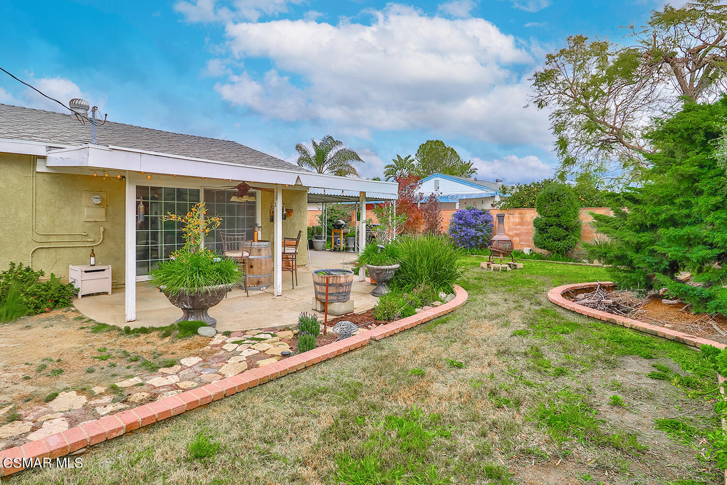1648 Spence Street Simi Valley, CA 93065 - Photo 32 of 41 a view of a house with garden and plants