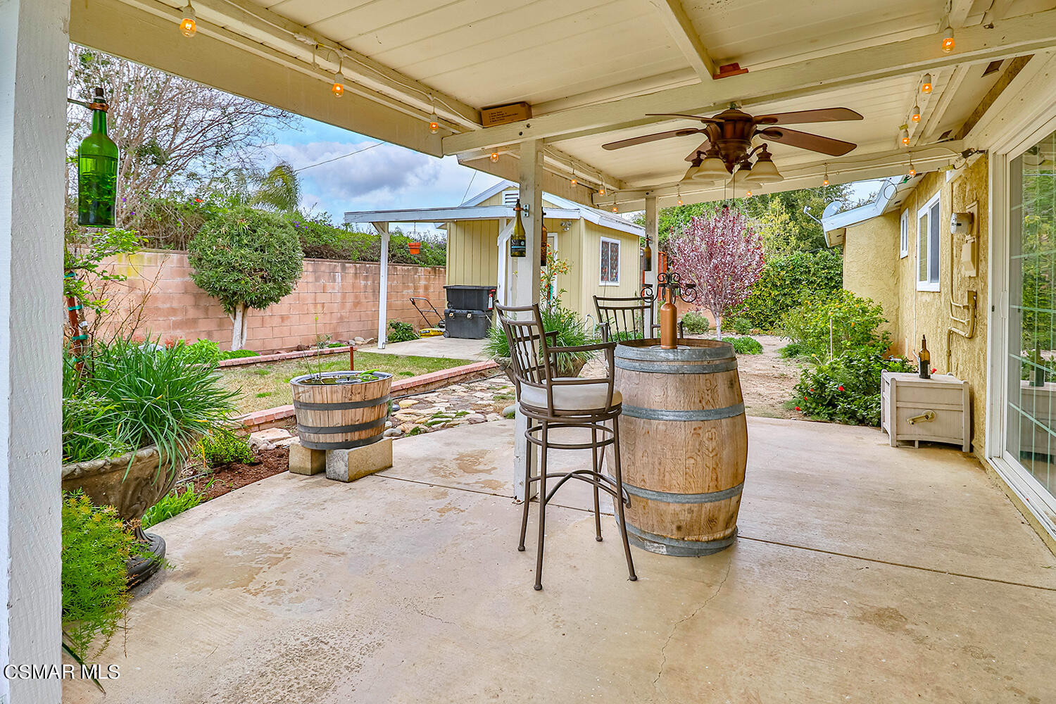 1648 Spence Street Simi Valley, CA 93065 - Photo 38 of 41 a backyard of a house with table and chairs