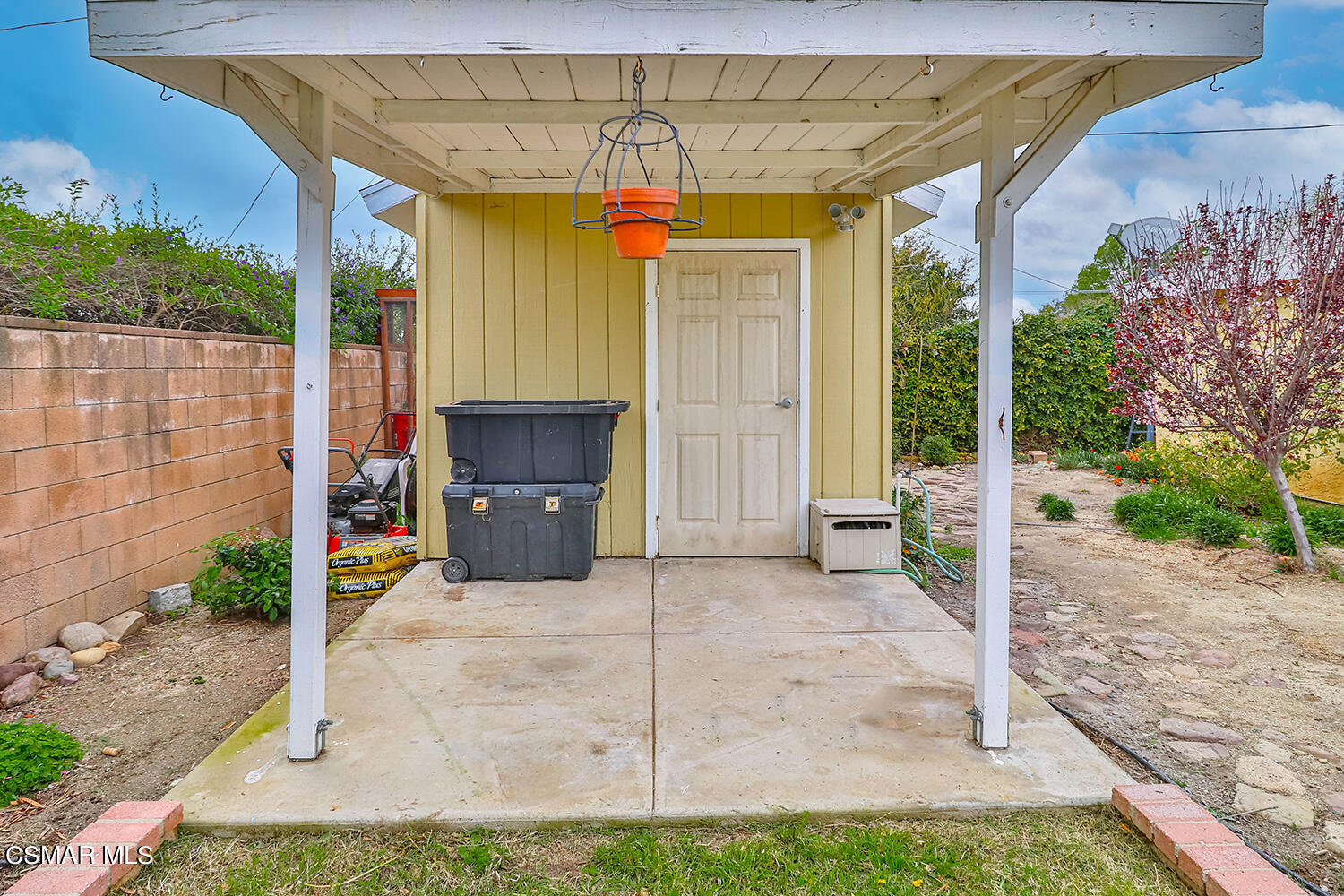 1648 Spence Street Simi Valley, CA 93065 - Photo 39 of 41 a view of a porch with furniture and a yard