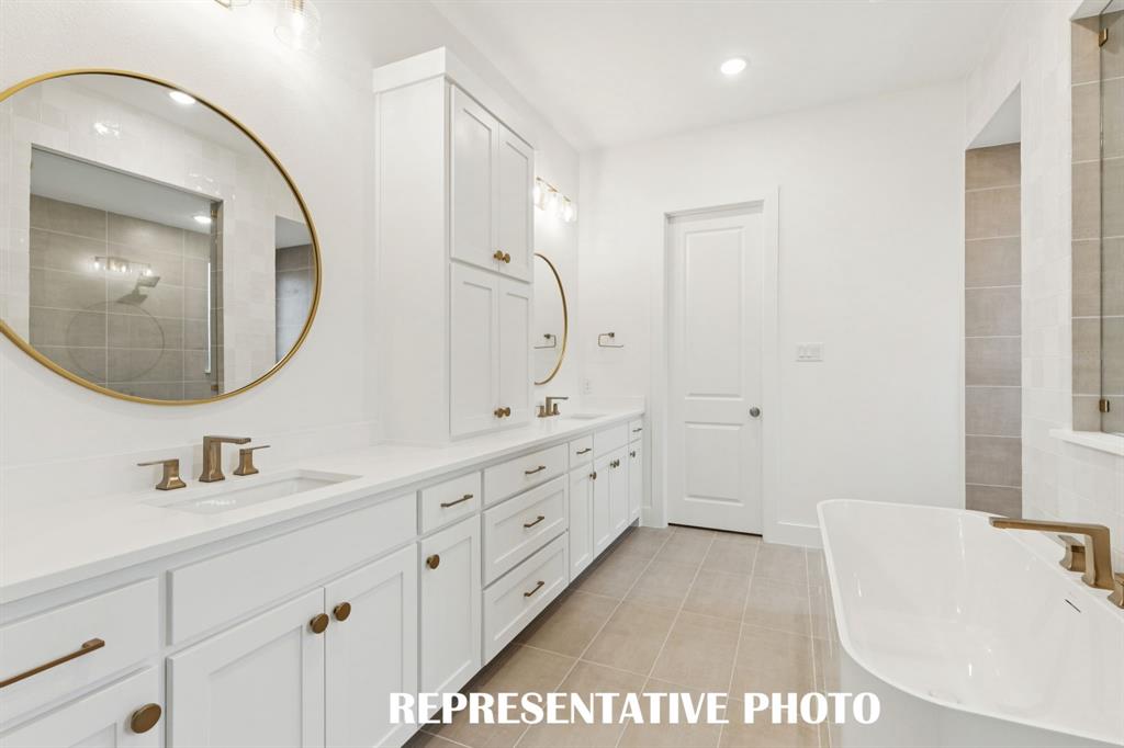 4051 Gambel Road Prosper, TX 75078 - Photo 10 of 20 No shortage of space or style in this over the top owner's bath. REPRESENTATIVE PHOTO