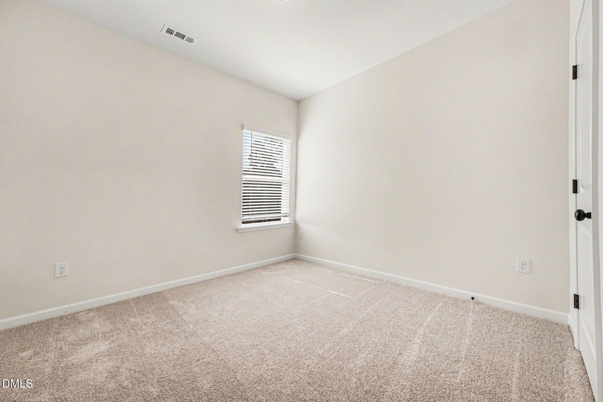 722 Orch Vista Circle Raleigh, NC 27606 - Photo 13 of 28 an empty room with windows