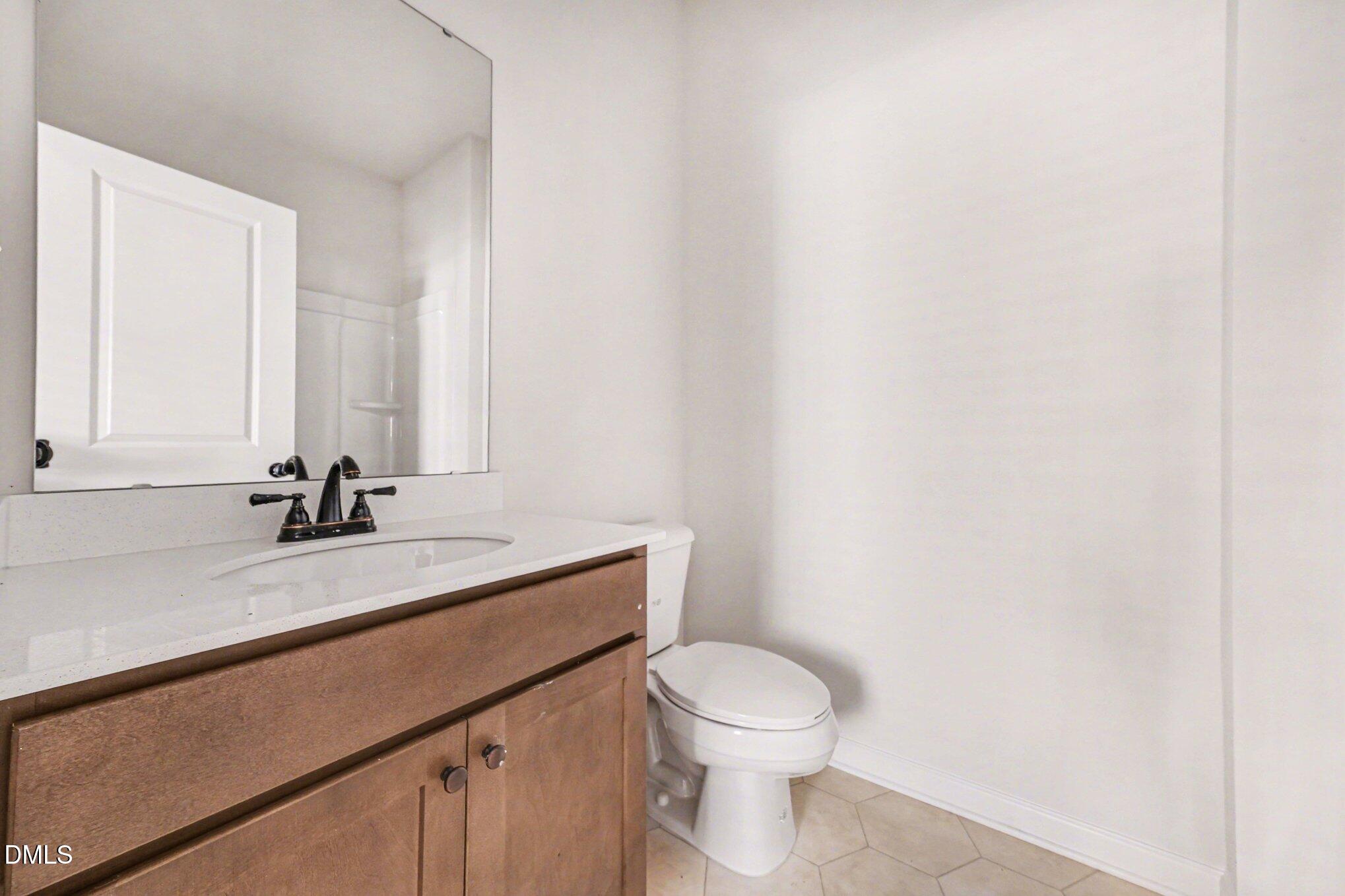 722 Orch Vista Circle Raleigh, NC 27606 - Photo 17 of 28 First Floor Bathroom