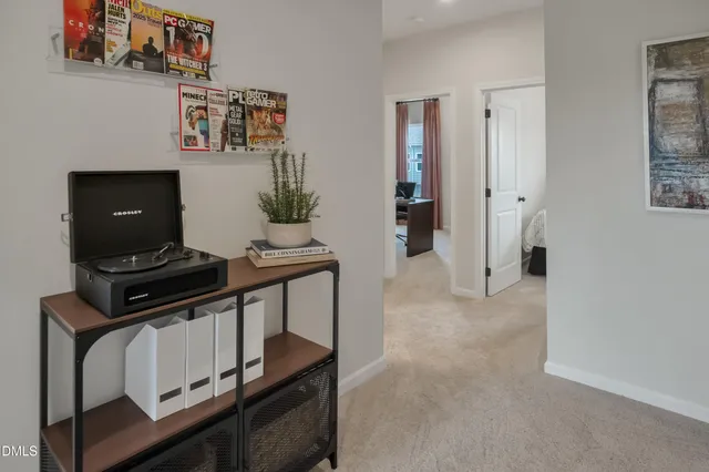 a kitchen with stainless steel appliances a refrigerator and a stove top oven