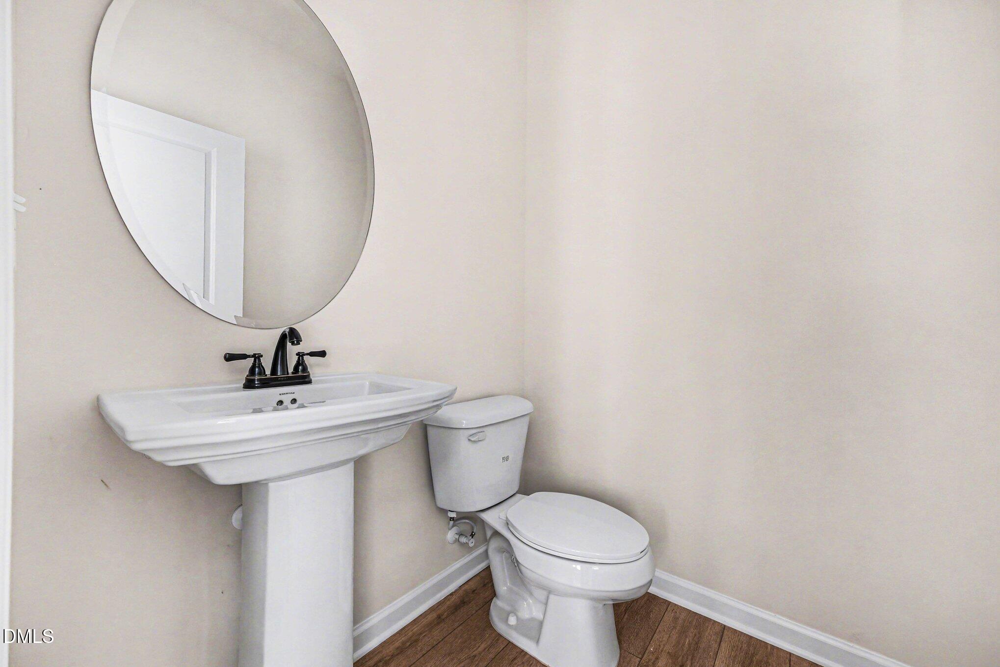 722 Orch Vista Circle Raleigh, NC 27606 - Photo 7 of 28 2nd Floor Powder Room