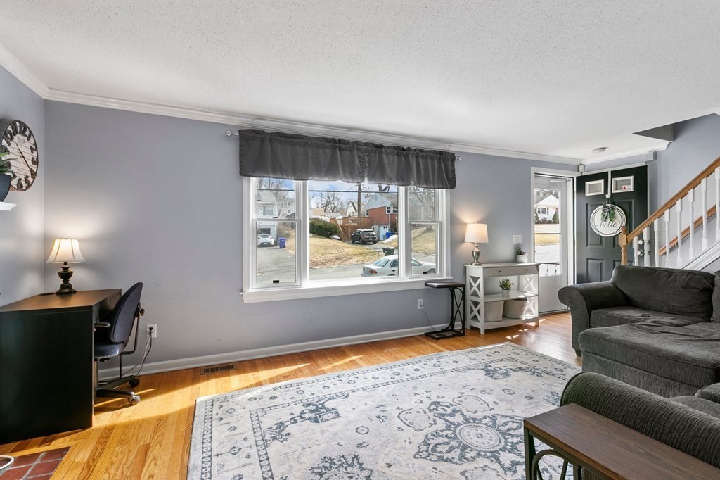 190 West Allen Ridge Road Springfield, MA 01118 - Photo 14 of 39 a living room with furniture and a large window