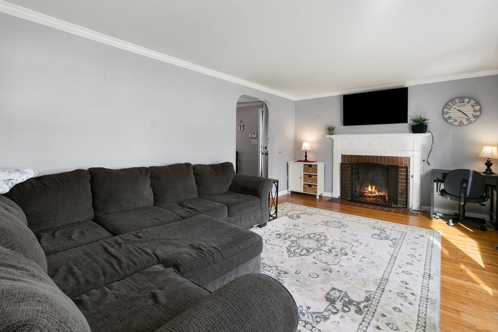 190 West Allen Ridge Road Springfield, MA 01118 - Photo 15 of 39 a living room with furniture and a fireplace
