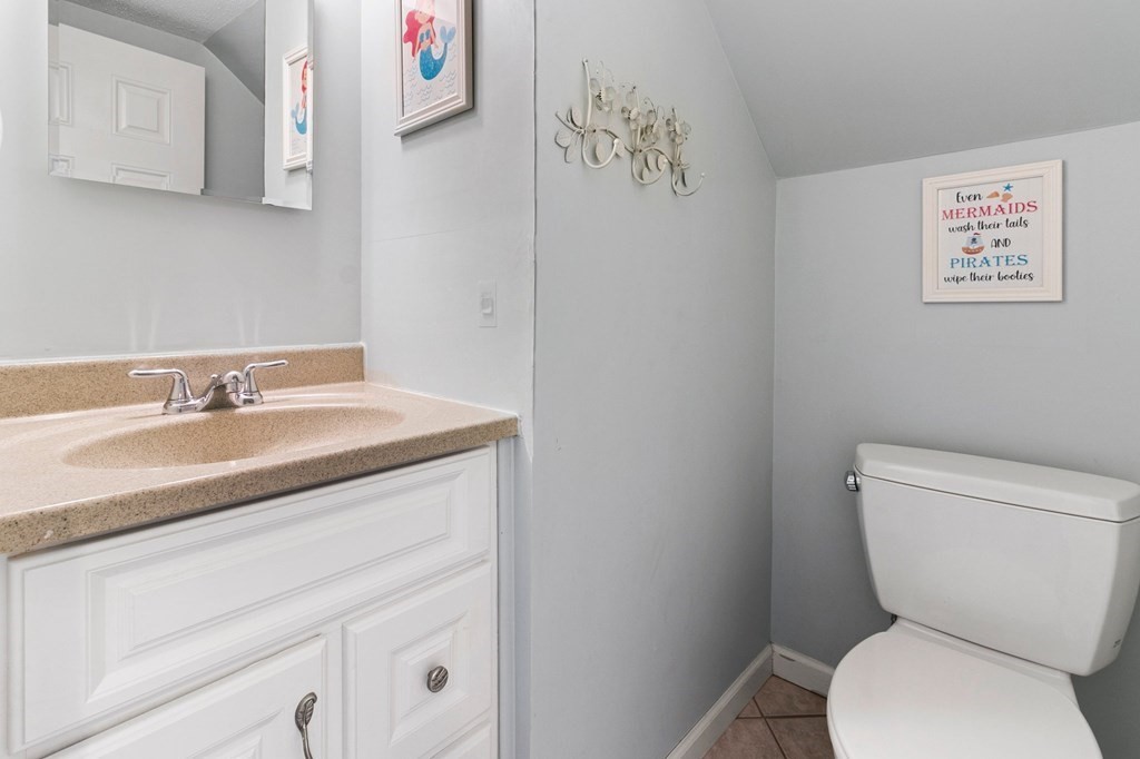 190 West Allen Ridge Road Springfield, MA 01118 - Photo 19 of 39 a bathroom with a toilet sink and mirror