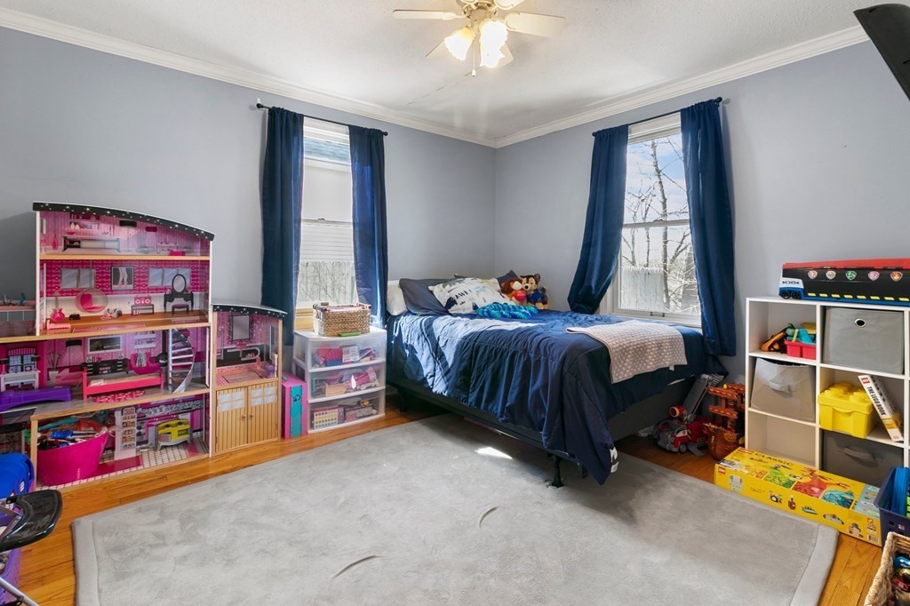 190 West Allen Ridge Road Springfield, MA 01118 - Photo 20 of 39 a bedroom with bed and a book shelf
