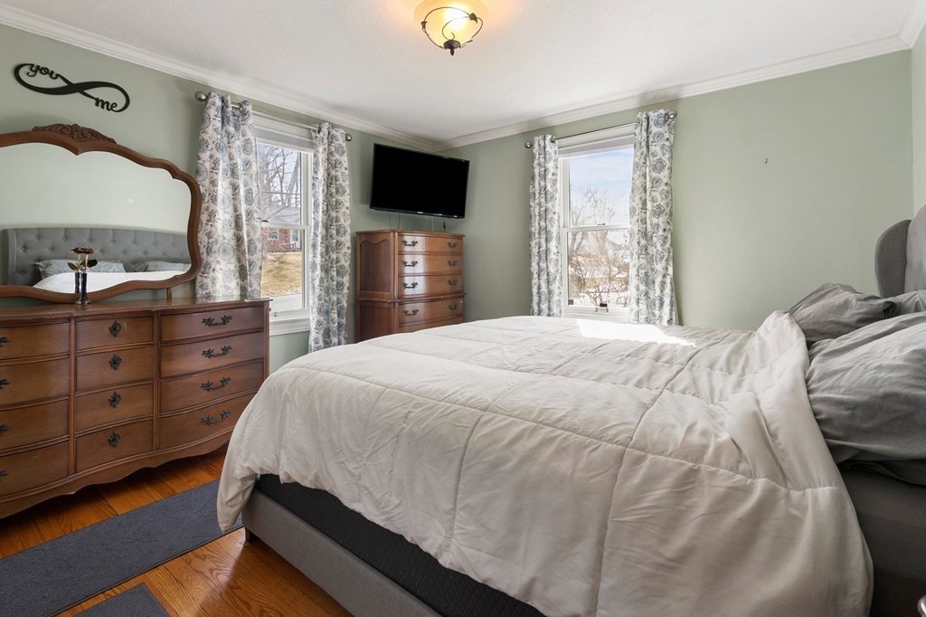 190 West Allen Ridge Road Springfield, MA 01118 - Photo 22 of 39 a bedroom with a bed and a flat tv screen on dresser