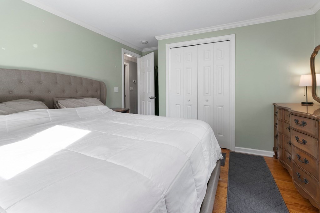 190 West Allen Ridge Road Springfield, MA 01118 - Photo 23 of 39 a bedroom with a bed and a lamp