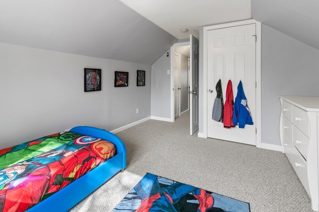 190 West Allen Ridge Road Springfield, MA 01118 - Photo 30 of 39 a room with a bed and a painting on the wall