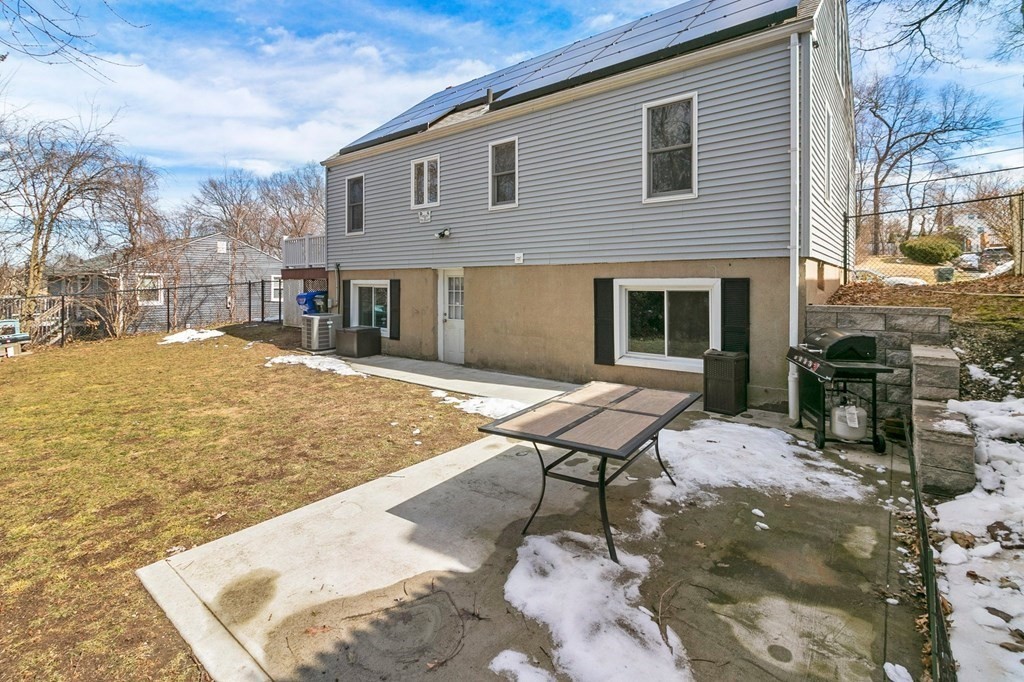 190 West Allen Ridge Road Springfield, MA 01118 - Photo 38 of 39 a backyard of a house with yard and outdoor seating