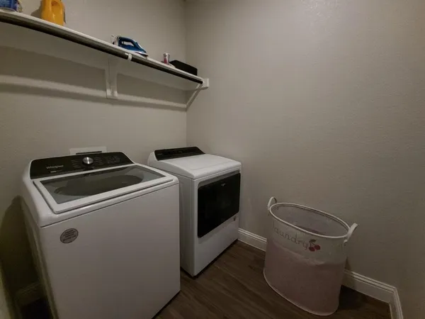 a utility room with dryer and washer