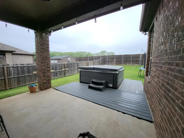 a view of a terrace with a garden