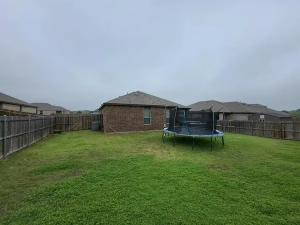 a house view with a outdoor space