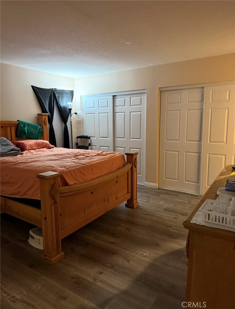 14565 Green River Road Victorville, CA 92394 - Photo 13 of 20 a bedroom with a bed and a dresser