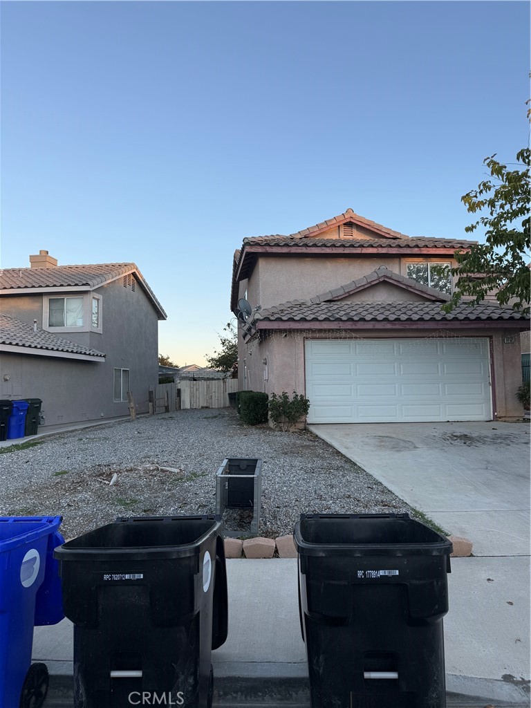 14565 Green River Road Victorville, CA 92394 - Photo 3 of 20 a kitchen with a sink and a potted plant