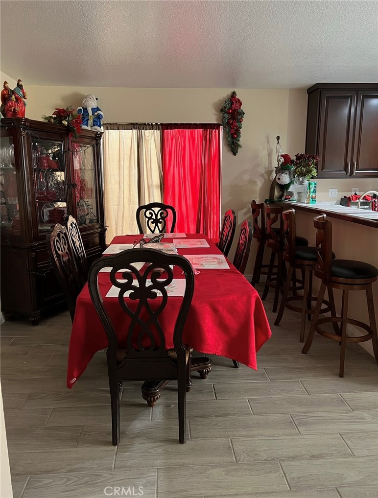 14565 Green River Road Victorville, CA 92394 - Photo 6 of 20 a bedroom with furniture and a closet