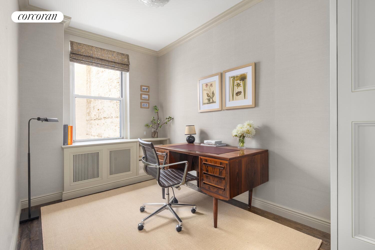 45 West 11th Street, Unit 4C Manhattan, NY 10011 - Photo 4 of 8 a view of a workspace with furniture and a window