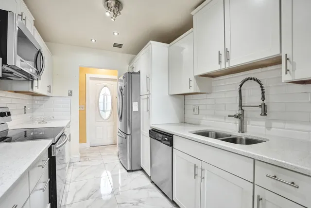 a view of a dining room with furniture