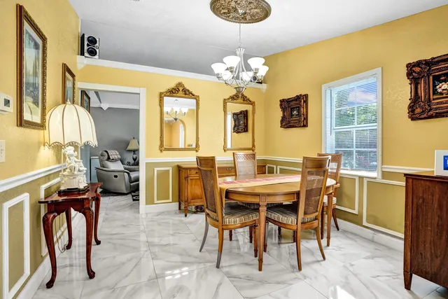 an aerial view of a house with a garden