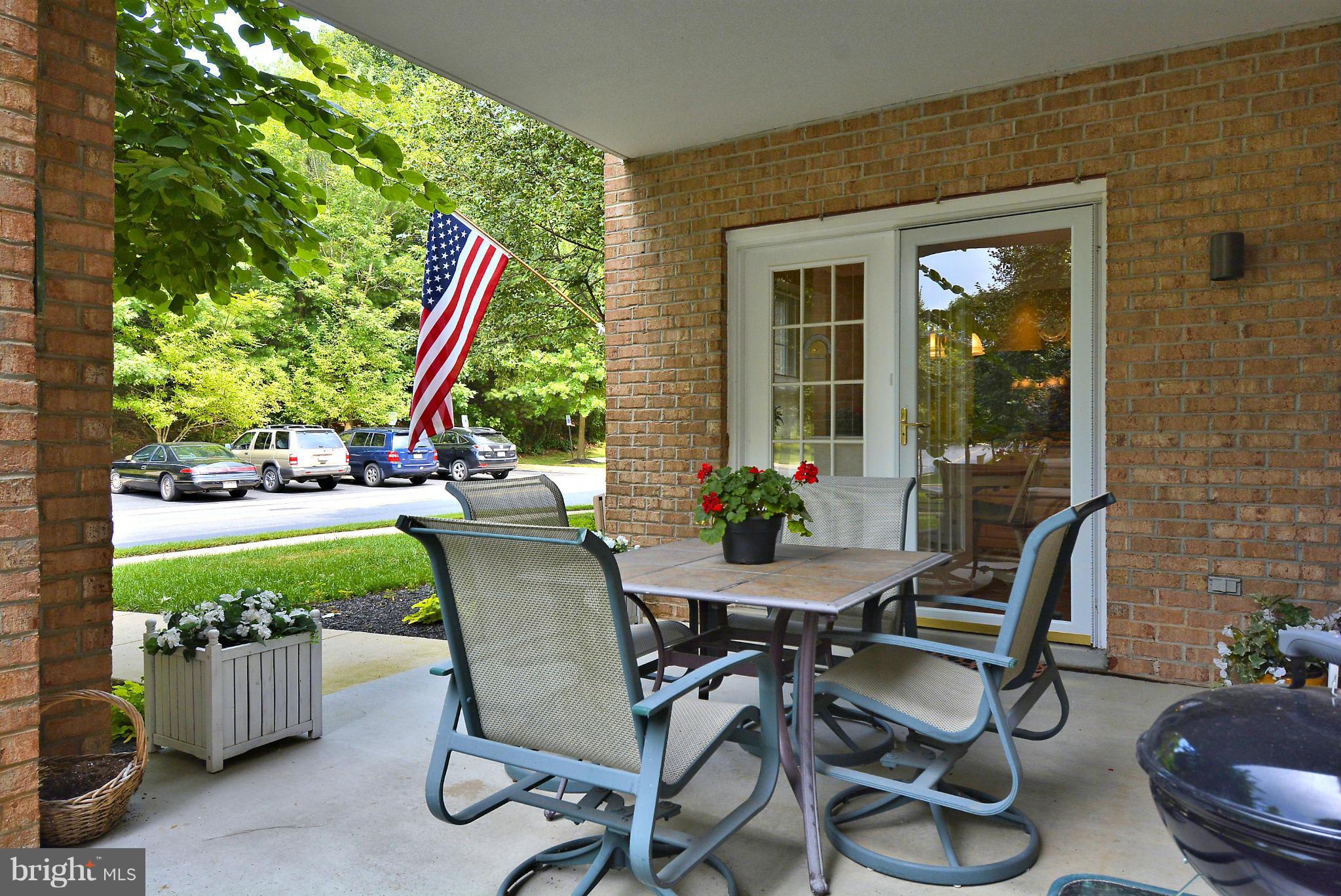 12310 Rosslare Ridge Road, Unit 107 Lutherville-Timonium, MD 21093 - Photo 17 of 18 Covered Patio with Private Entry