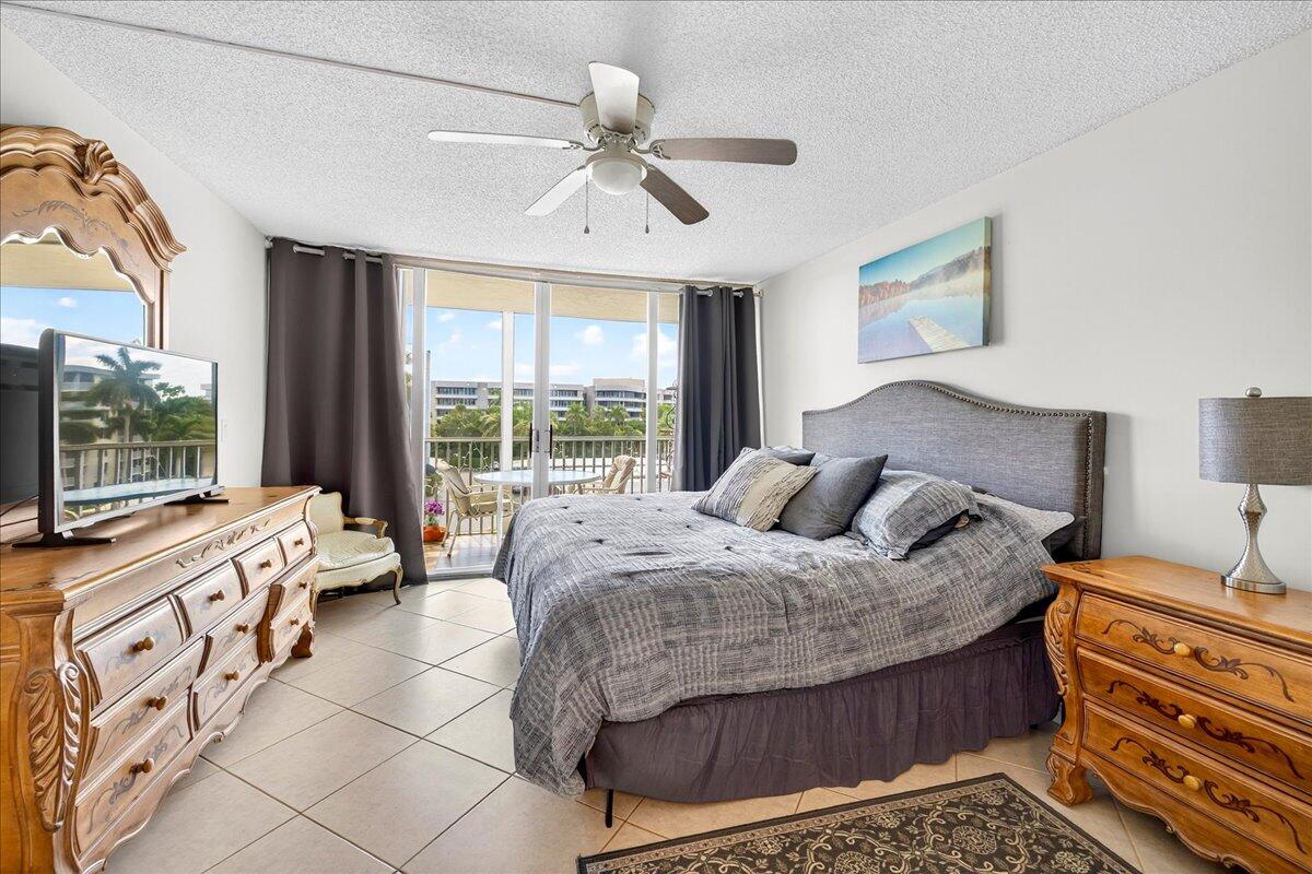 1 Harbourside Drive, Unit 3505 Delray Beach, FL 33483 - Photo 13 of 38 a bedroom with a bed and a window