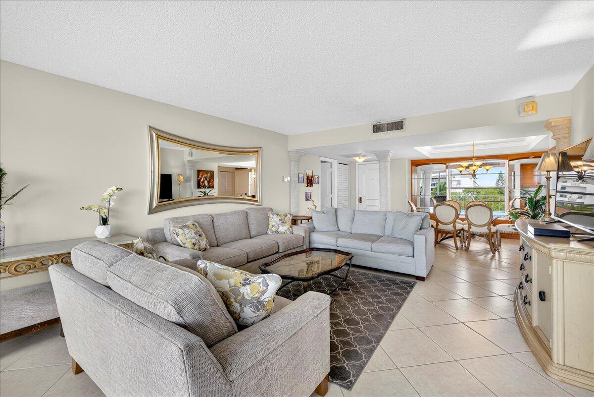 1 Harbourside Drive, Unit 3505 Delray Beach, FL 33483 - Photo 5 of 38 a living room with furniture and wooden floor