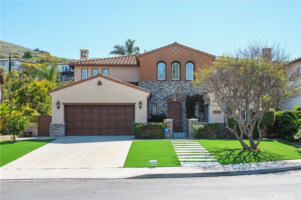 28492 Calle Pinata San Juan Capistrano, CA 92675 - Photo 1 of 29 a front view of a house with a yard